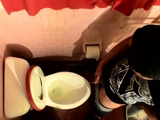 Homosexual dude pissing in the bathroom and stroking on internet digicam