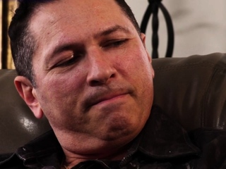 Inked spouse sucks and rides bosses cock whereas husband watches