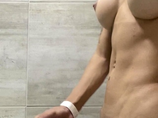 Tranny with Massive Tits Jerking Off her Massive Cock