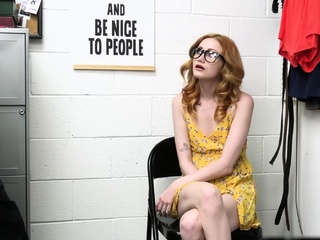 Nerd on her knees sucking officers meat