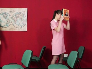 Clothed dominas jerking naked guy