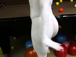 Attractive babe wears clown makeup and teases