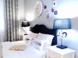 Busty curly brunette with major boobs fucks on couch