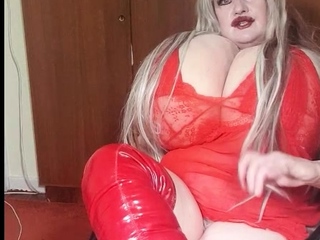 Susi wearing red fishnet red boots teasing lick my boots