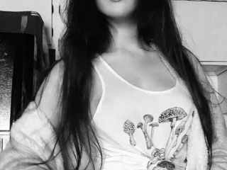 Modest titted brunette teen fingering on the bed