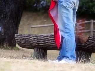 A younger homosexual having a very good wank in public