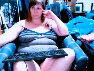 Busty curly brunette with huge boobs fucks on sofa