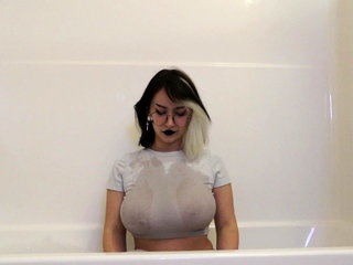 Huge boobs milf masturbates along with her dildo