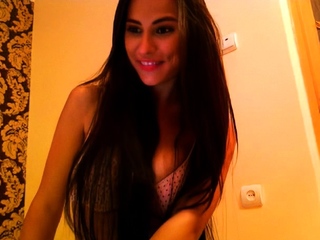 Busty curly brunette with large boobs fucks on sofa