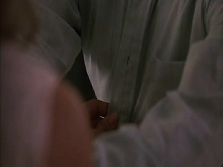 Kelly Preston eradicating her bra to disclose her good breasts,