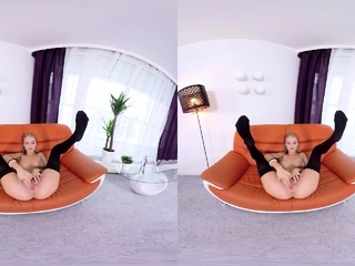 Sizzling skinny blonde masturbates on sofa