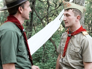 Attractive DILF Scoutmaster seduces and barebacks boy within the woods