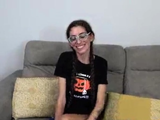 Small tit brunette newbie tugs on a giant willie